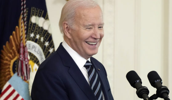 President Joe Biden speaks in the East Room of the White House in Washington, D.C., on Tuesday. Biden's campaign has announced his name will not appear on the Democratic primary ballot in New Hampshire.