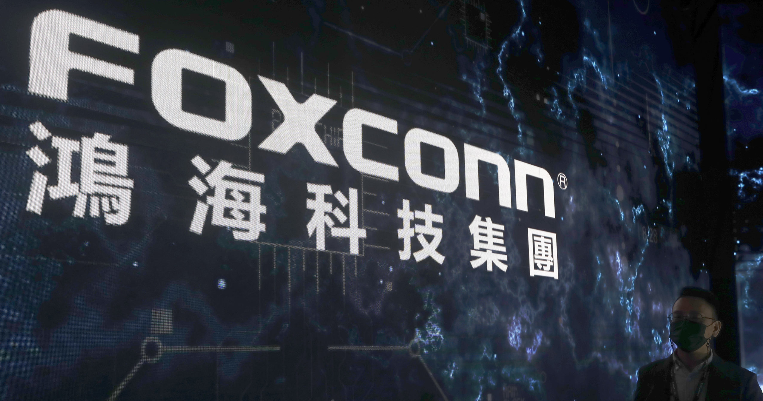 The Foxconn logo is seen at the Nangang Exhibition Center in Taipei, Taiwan. Foxconn, a Fortune 500 company known globally for making Apple iPhones, was recently subjected to searches by Chinese tax authorities, state media reported Oct. 22, 2023.