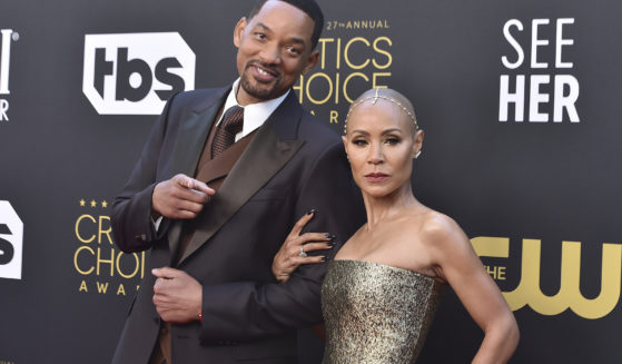 Will Smith, left, and Jada Pinkett Smith, seen at a March 2022 event, have lived what Pinkett-Smith says are “completely separate lives” since 2016. She made the revelation in an interview with Hoda Kotb.
