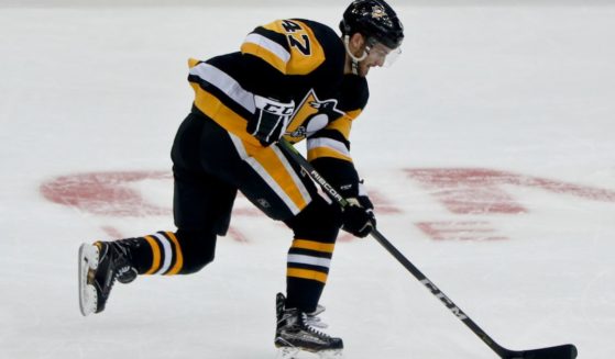 Then-Pittsburgh Penguins player Adam Johnson plays against the Columbus Blue Jackets during an NHL preseason hockey game in Pittsburgh, Pennsylvania, on Sept. 22, 2018.