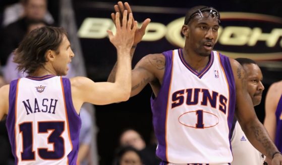 Phoenix Suns player Amar'e Stoudemire, right, high-fives teammate Steve Nash, left, during the NBA game against the Los Angeles Lakers in Phoenix, Arizona, on March 12, 2010. Stoudemire took to Instagram to address the situation in Israel and call out politicians and BLM over their reaction, or lack thereof, to the crisis.