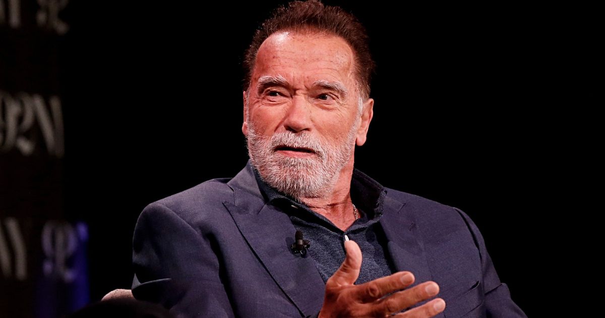 Arnold Schwarzenegger talks with podcaster Ryan Holiday at the 92nd Street Y in New York City on Tuesday.