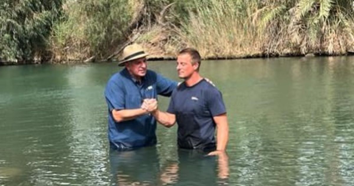 Survivalist and TV star Bear Grylls is baptized in the Jordan River.