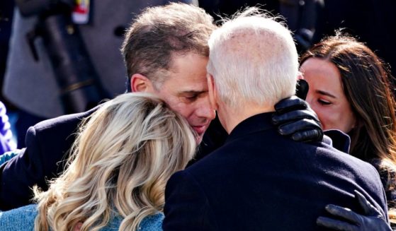 President Joe Biden is embraced by his son Hunter Biden, first lady Jill Biden and daughter Ashley Biden after being sworn in at the U.S. Capitol in Washington, D.C., on Jan. 20, 2021.
