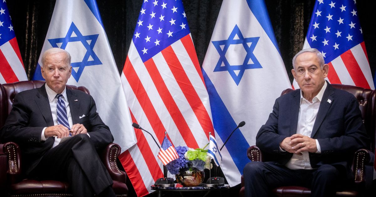 President Joe Biden, left, meets with Israeli Prime Minister Benjamin Netanyahu, right, at the start of the Israeli war cabinet meeting in Tel Aviv, Israel, on Wednesday.