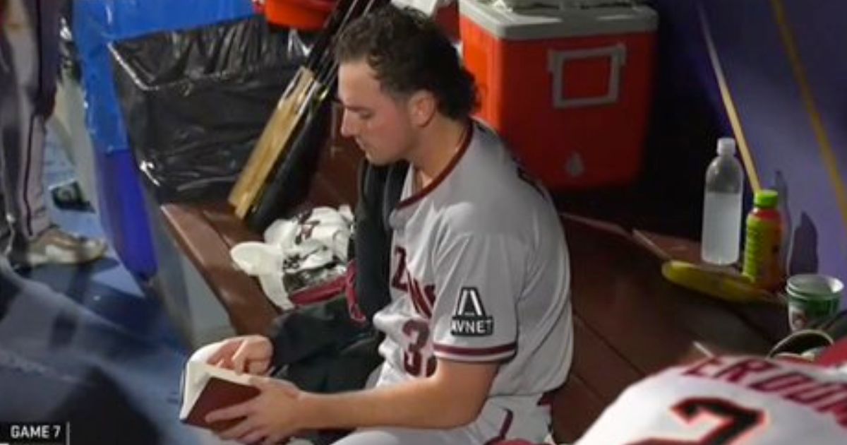 During the first inning of Tuesday night's game against the Philadelphia Phillies, Arizona Diamondbacks pitcher Brandon Pfaadt was seen reading what appeared to be a Bible.