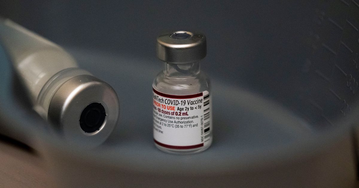 A vial of the Pfizer COVID-19 vaccine, labeled for ages 2 to 5 during research but deemed acceptable for children below age 2, is seen at UW Medical Center - Roosevelt in Seattle on June 21, 2022.