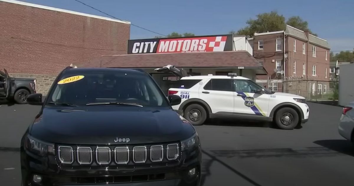 On Wednesday, Philadelphia police are filmed outside of a newly opened City Motors car dealership, where owner Nathan Kriegle had seven cars and their titles stolen within one week.