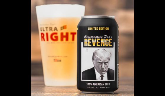 The limited edition Conservative Dad's Revenge beer can features former President Donald Trump's mugshot from Fulton County, Georgia.