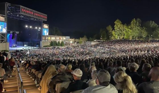 About 10,000 individuals fill the Brandon Amphitheater near Jackson, Mississippi, on Wednesday, the final day of Rick Gage's crusade.