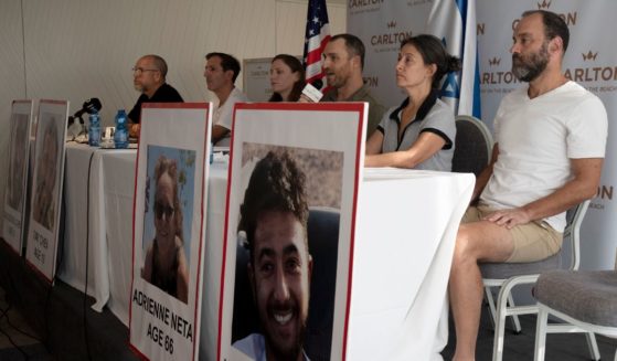 Relatives of U.S. citizens who are missing since Saturday's surprise attack by Hamas terrorists near the Gaza border attend a news conference in Tel Aviv, Israel, on Tuesday. They are, from left, Jonathan Dekel-Chen, father of Sagui Dekel-Chen; Ruby Chen, father of Itay Chen; Ayala Neta, daughter, and Nahal Neta, son of Adrienne Neta; Rachel Goldberg, mother of Hersh Goldberg-Polin; and Jonathan Polin, Hersh's father.