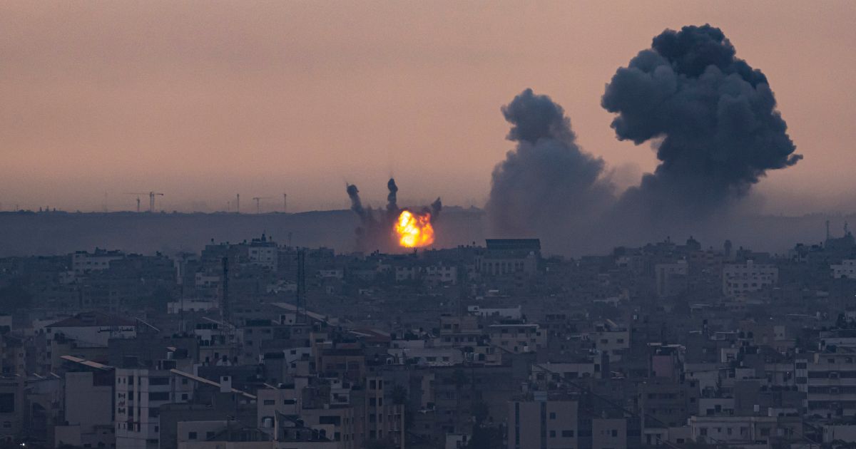 Smoke rises after Israeli strikes on the Gaza Strip on Monday morning. Hamas has released a statement Monday claiming they will publicly kill hostages if Israel continues to attack Gaza.