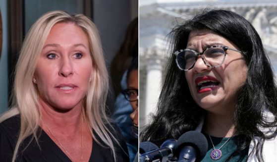 At left, Republican Rep. Marjorie Taylor Greene of Georgia arrives on Capitol Hill in Washington on Tuesday. At right, Democratic Rep. Rashida Tlaib of Michigan speaks during a news conference on Capitol Hill on May 25.