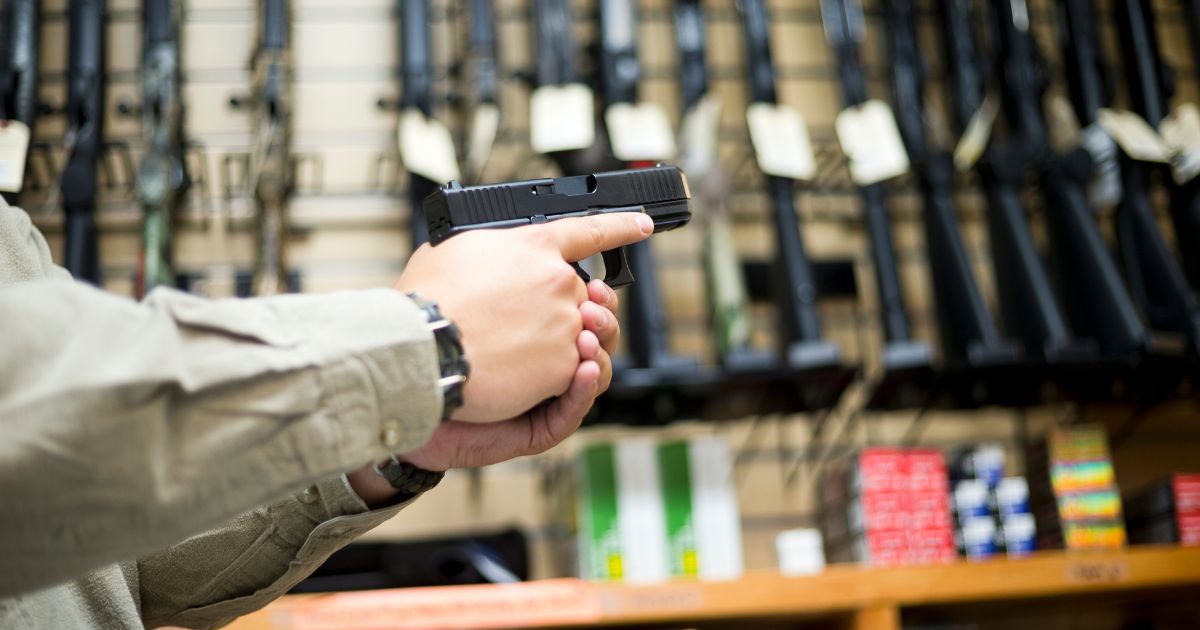 Man attempts to rob gun store with hammer, quickly realizes the stupidity of his plan.