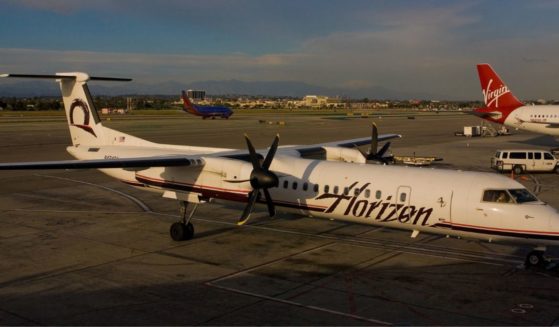 A Bombardier Q400 Horizon Air turboprop plane is pictured at Los Angeles International Airport in Los Angeles, California, on March 19, 2011. On Sunday, a pilot in the third seat of the cockpit of a Horizon Air plane attempted to shutdown the engines midflight and now faces dozens of charges.