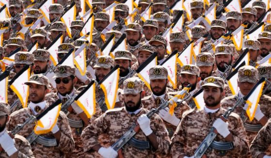 Members of Iran's Revolutionary Guard march during an annual military parade just outside Tehran, Iran, on Sept. 22.
