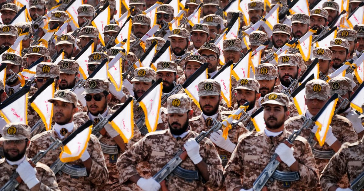 Members of Iran's Revolutionary Guard march during an annual military parade just outside Tehran, Iran, on Sept. 22.