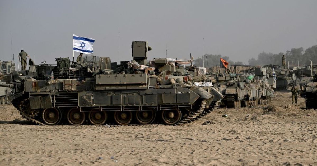 Israeli military armored vehicles deploy along Israel's border with Gaza on October 24 amid the ongoing battles between Israel and the Palestinian group Hamas.