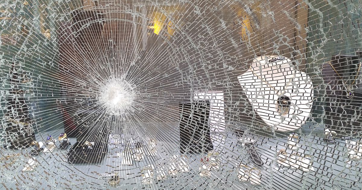 Police said the suspects pepper-sprayed employees and used hammers to smash display cases at a mall jewelry store similar to the one shown in this stock photo.