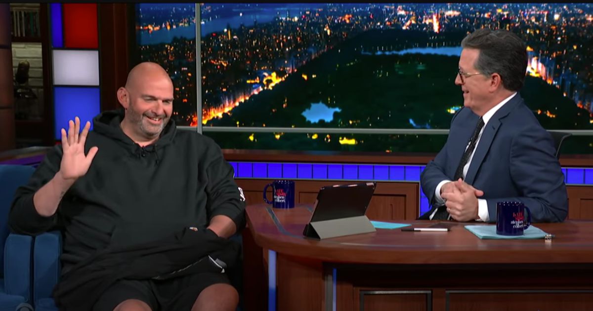 On Wednesday, Sen. John Fetterman, left, appeared on "The Late Show with Stephen Colbert," where he told host Stephen Colbert, right, that Americans do "not send their best and brightest to D.C." when he referenced his Republican colleagues.