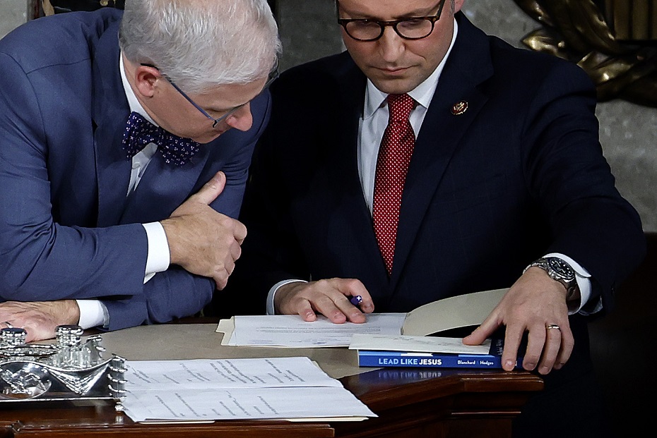 "Lead Like Jesus" is seen on the desk as House Speaker Pro Tempore Patrick McHenry, left, talks to Louisiana Rep. Mike Johnson before the House of Representatives votes on a new speaker at the U.S. Capitol in Washington on Wednesday.