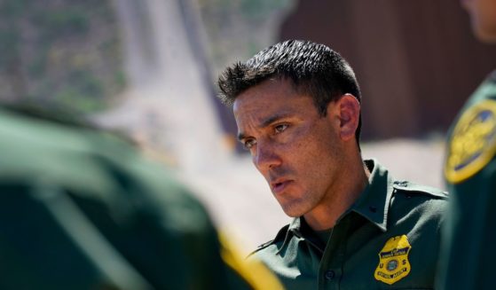 Border Patrol Deputy Chief Justin De La Torre speaking along the border fence of the U.S.-Mexico border