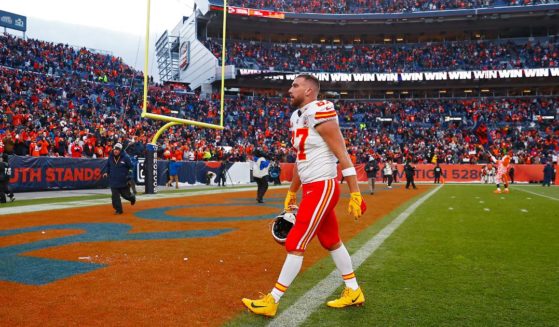 Kansas City tight end Travis Kelce, who is dating pop star Taylor Swift, walks off the field after the Chiefs lose to the Denver Broncos 24-9 at Mile High Stadium on Sunday.