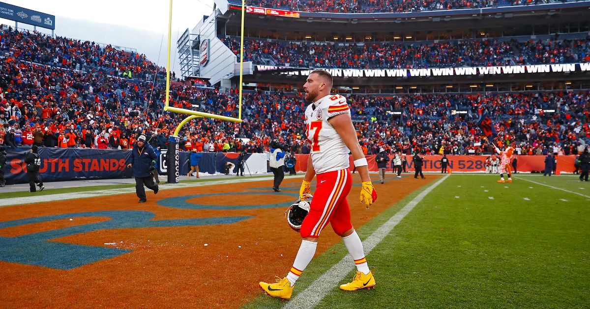 Kansas City tight end Travis Kelce, who is dating pop star Taylor Swift, walks off the field after the Chiefs lose to the Denver Broncos 24-9 at Mile High Stadium on Sunday.