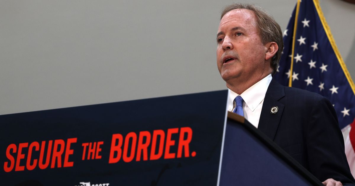 Texas Attorney General Ken Paxton, seen in a 2021 photo, is suing the federal government for directing Border Patrol employees to cut razor wire to allow illegal immigrants through.