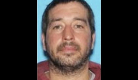 This photo shows Robert Card, whom police have identified as a person of interest in connection to mass shootings in Lewiston, Maine, on Wednesday.