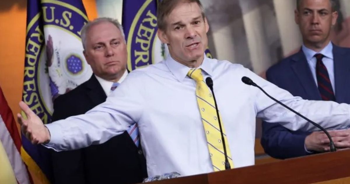Rep. Jim Jordan speaks at a press conference as Rep. Steve Scalise looks on following a Republican caucus meeting at the U.S. Capitol.
