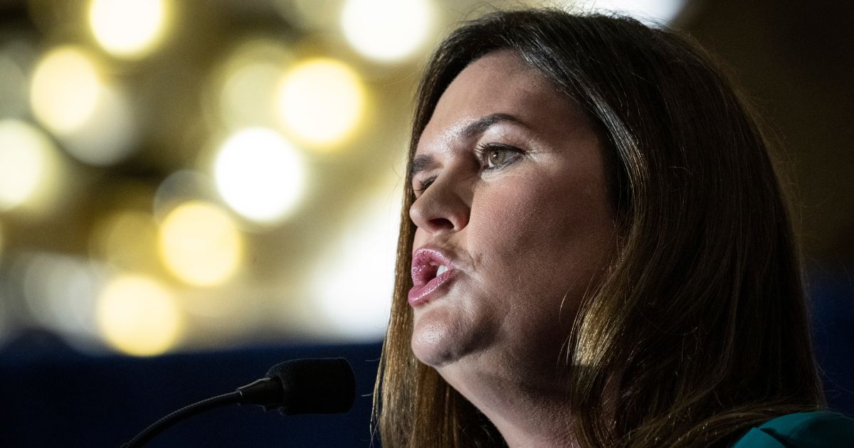Then Gov.-elect Sarah Huckabee Sanders speaks during the America First Agenda Summit in Washington, D.C., on July 26, 2022. On Thursday, Huckabee Sanders signed an executive order to keep anti-woke language against women out of government use.