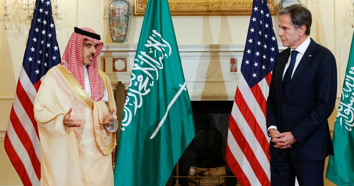 Secretary of State Antony Blinken, right, and Saudi Arabian Foreign Minister Prince Faisal bin Farhan deliver remarks to reporters before meeting at the State Department in Washington on Oct. 14, 2021.