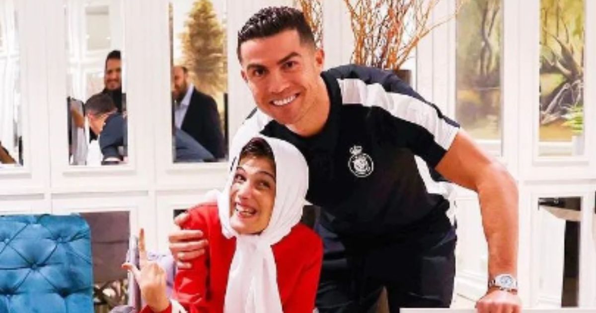 Soccer star Christiano Ronaldo, right, embraced Iranian artist Fatemeh Hamami, while meeting with fans.