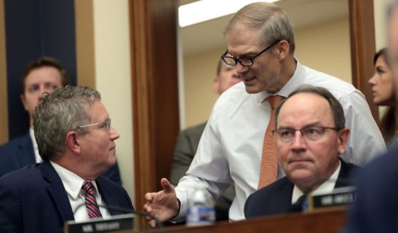 Ohio GOP Rep. Jim Jordan, Chairman of the House Judiciary Committee, center, talks to Kentucky GOP Rep. Thomas Massie, left, during a hearing in September. Jordan has said he will run for Speaker of the House to replace California Rep. Kevin McCarthy, who was ousted from the speaker position Tuesday.