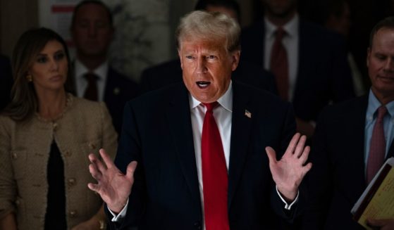 Former President Donald Trump speaks to reporters during a lunch break on the third day of his civil fraud trial at the New York State Supreme Court in New York City on Wednesday.