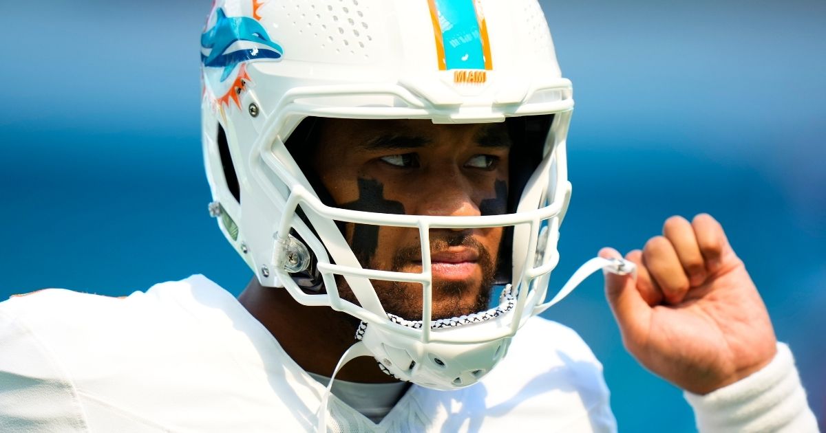 Tua Tagovailoa of the Miami Dolphins warms up prior to a game against the Carolina Panthers at Hard Rock Stadium in Miami Gardens, Florida, on Sunday.
