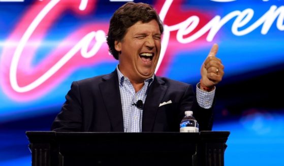 Tucker Carlson speaks at the Turning Point Action conference in West Palm Beach, Florida, on July 15. On Tuesday, Carlson secured a $15 million investment for his new media company.