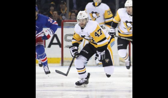 Adam Johnson #47 of the Pittsburgh Penguins skates against the New York Rangers at Madison Square Garden on March 25, 2019 in New York City. The Penguins defeated the Rangers 5-2.