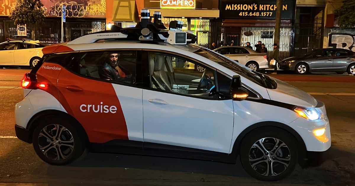 A passenger sits in the back of a Cruise driverless taxi in San Francisco's Mission District on Feb. 15.