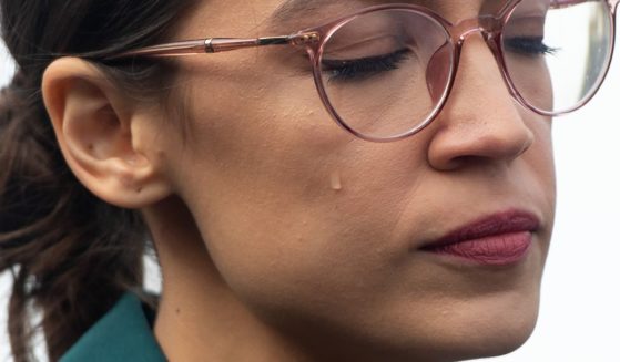 US Representative Alexandria Ocasio-Cortez, Democrat of New York, sheds a tear during a press conference calling on Congress to cut funding for US Immigration and Customs Enforcement (ICE) and to defund border detention facilities, outside the US Capitol in Washington, DC, February 7, 2019.