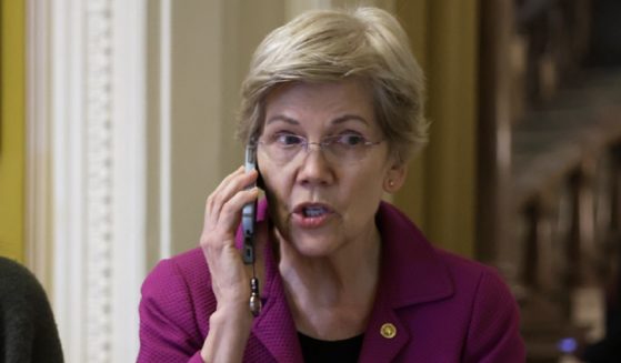 Massachusetts Sen. Elizabeth Warren is pictured talking on a cell phone in a May file photo in Washington.