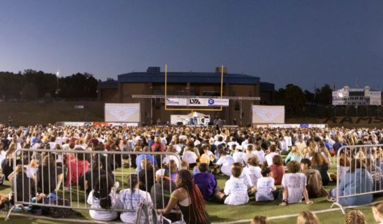 Thousands of young people gathered on a high school football field in Hot Springs, Arkansas, for an evening of Christian fellowship on Oct. 11.