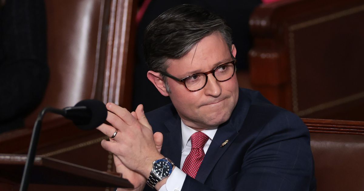 Rep. Mike Johnson of Louisiana applauds alongside fellow lawmakers as the House of Representatives holds an election for a new Speaker of the House at the U.S. Capitol on Wednesday in Washington, D.C.