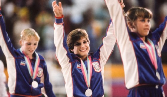 Mary Lou Retton and teammates wave to the crowd following a medal ceremony during the Women's Gymnastics competition of the 1984 Summer Olympic Games in Los Angeles.