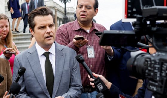 Florida Rep. Matt Gaetz addresses reporters outside the Capitol on Friday, a day before a funding deal was reached to avert a government shutdown.