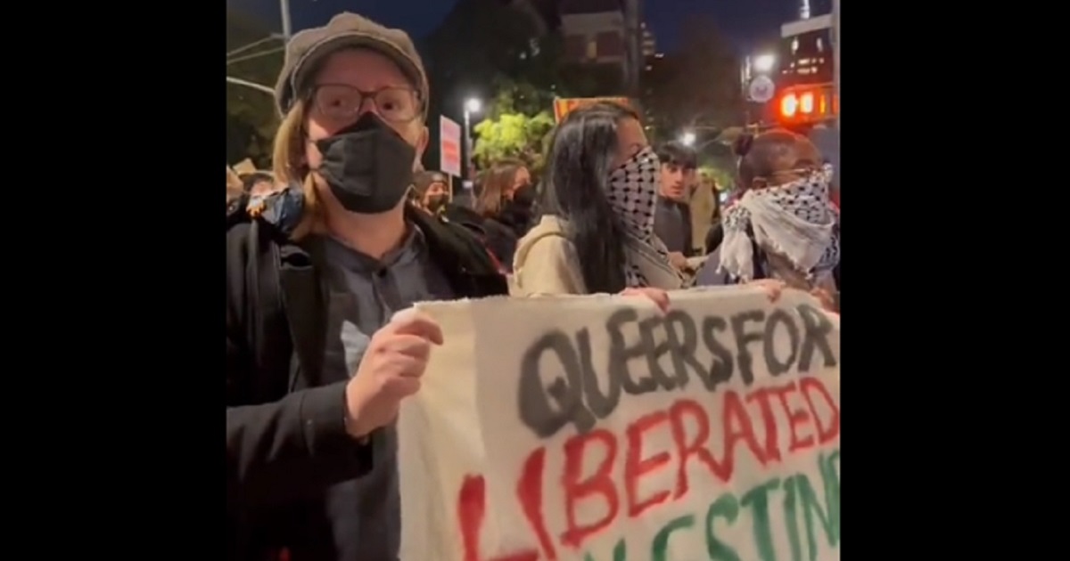 Protesters march in New York City to support Palestinian rights.