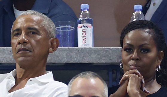Barack Obama and his wife Michelle Obama look on during the Women's Singles First Round match between Coco Gauff of the United States and Laura Siegemund of Germany on Day One of the 2023 US Open at the USTA Billie Jean King National Tennis Center on August 28, 2023 in the Flushing neighborhood of the Queens borough of New York City.