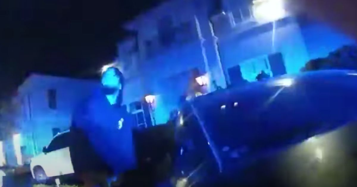 The above still is from body camera footage of New Orleans Saints wide receiver Chris Olave’s arrest.