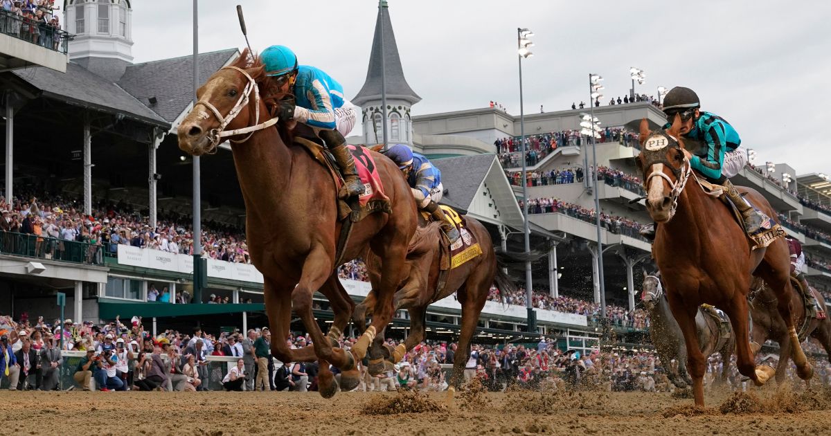 Mage (8), with Javier Castellano aboard, wins the 149th running of the Kentucky Derby horse race at Churchill Downs May 6 in Louisville, Kentucky.